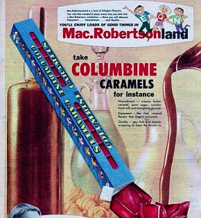 Packet of Colombines in front of an advertisement