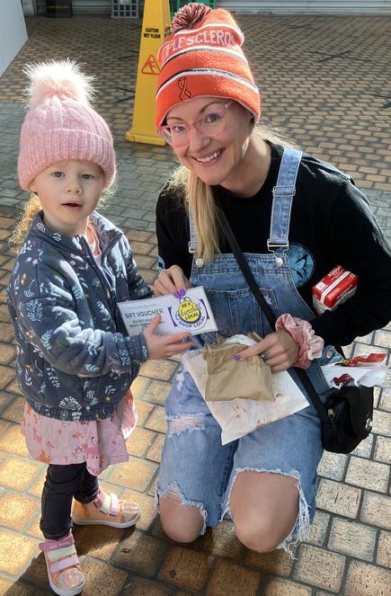 Shop Local 2024-05 Mother and daughter with voucher