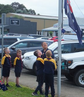 Scouts raising the flag